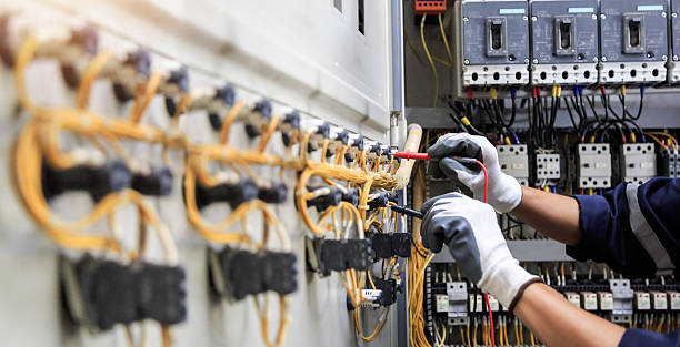 Professional Electrician technician working in Newark, TX